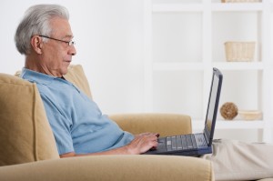 Older gentleman using a computer